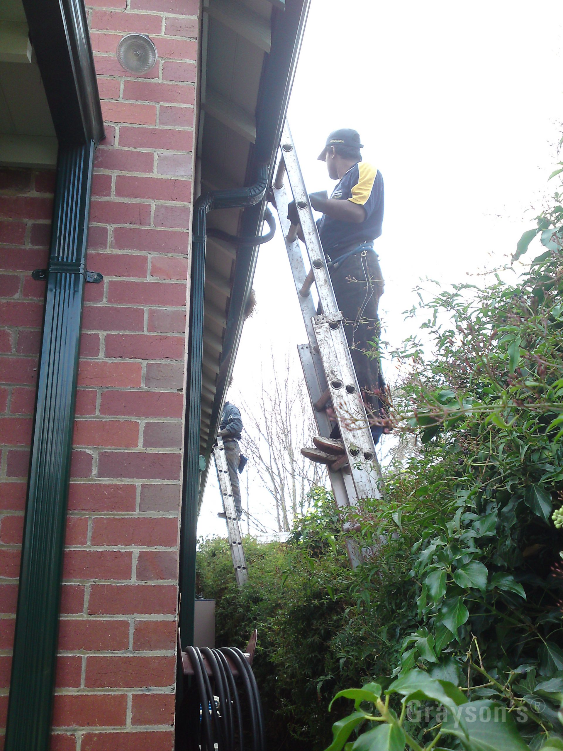 Cleaning gutters on a house in Yarra Ranges