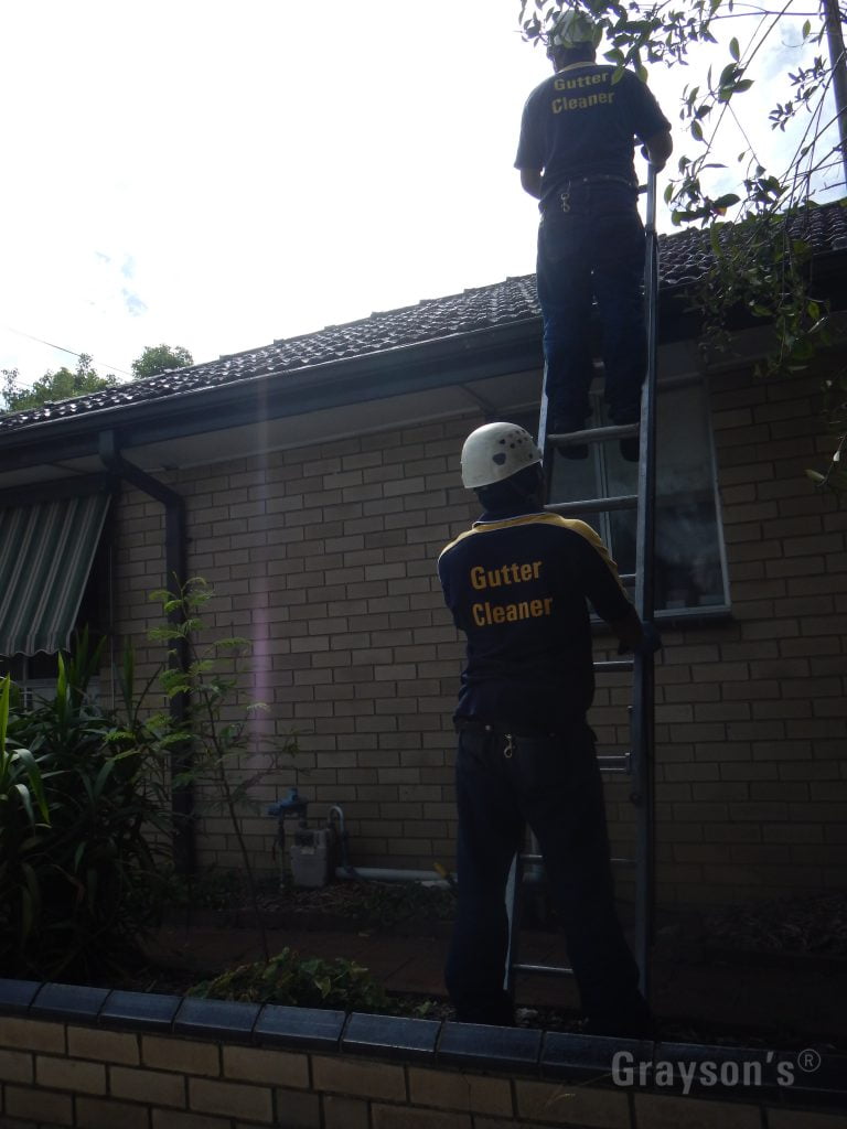 Expert Gutter Cleaners taking care to check all systems are flowing properly and towards the downpipes.