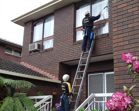Cleaning Windows on a Home in Melbourne