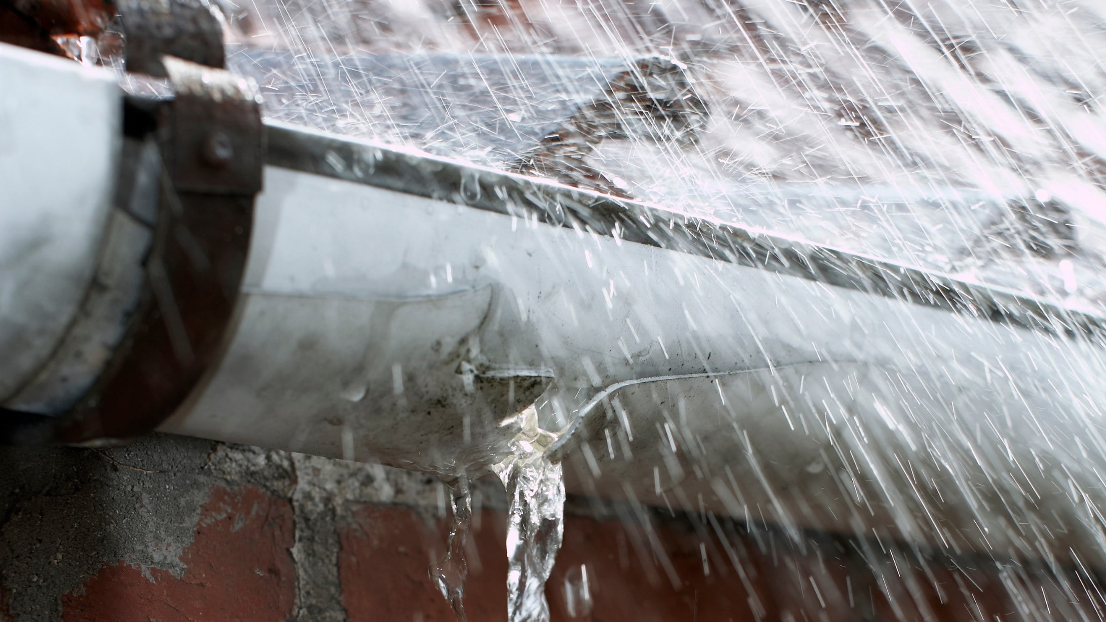 Water floods overboard when heavy storms hit blocked gutters.