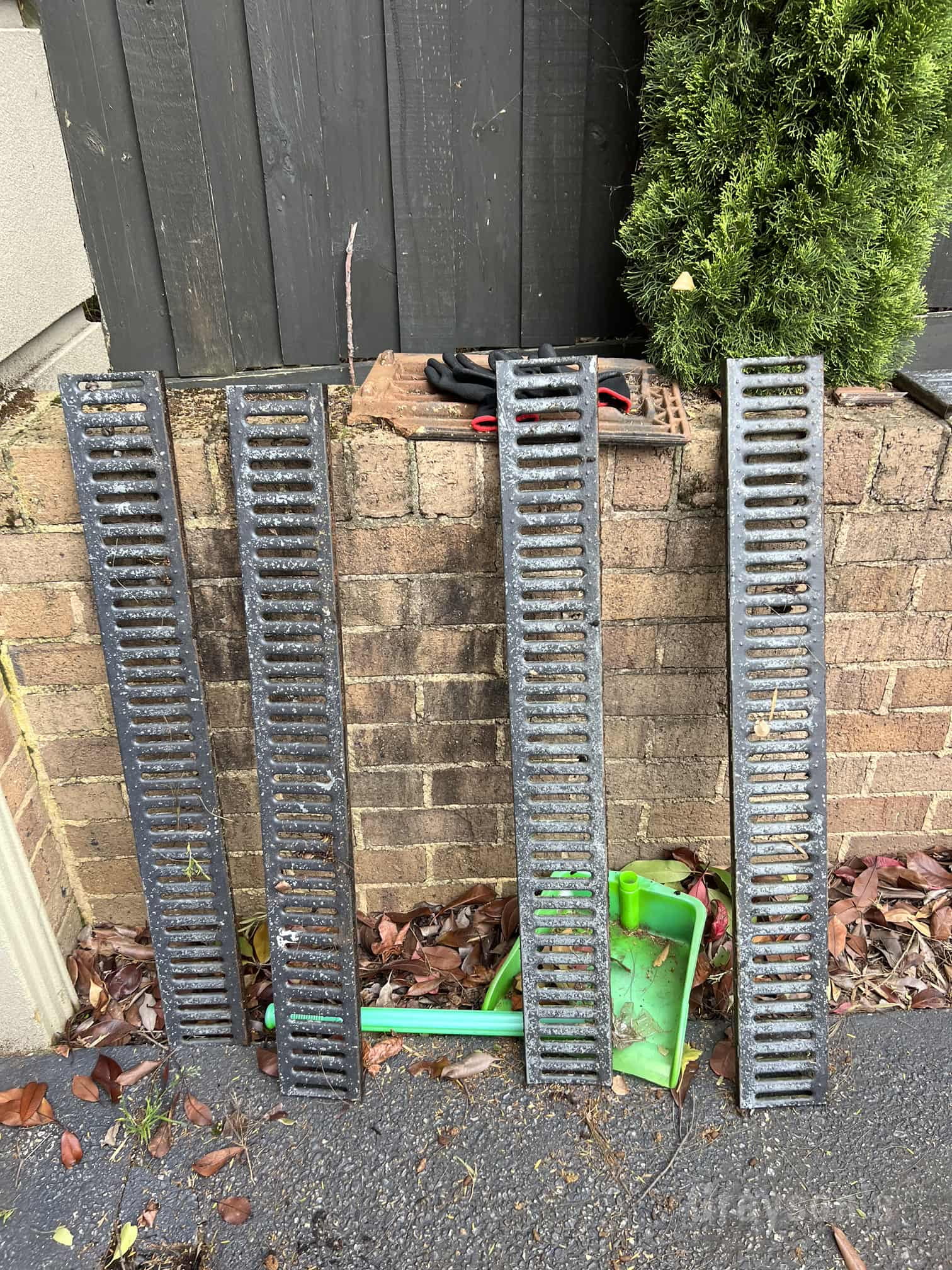 Grille removed from driveway pits